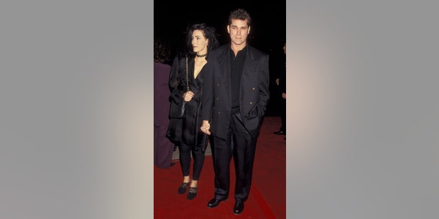 Ray Liotta and Michelle Grace attend the world premiere of "Philadelphia" on December 14, 1993