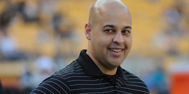 Director of Football & Business Operations Omar Khan of the Pittsburgh Steelers looks on from the sideline before a preseason game against the Kansas City Chiefs at Heinz Field on August 24, 2013, in Pittsburgh, Pennsylvania.