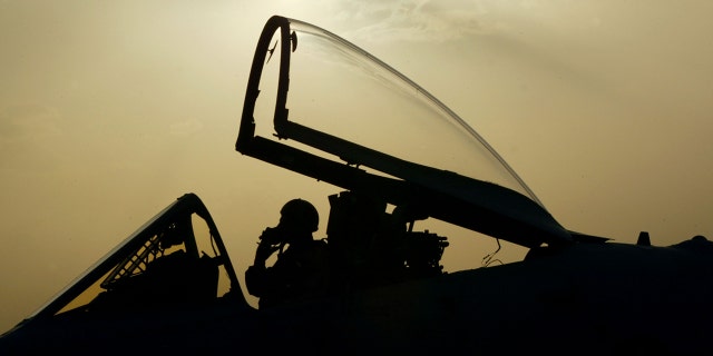 An A-10 Warthog pilot taxis on the flight line before takeoff at an airbase March 16, 2003, in the Arabian Gulf near the Iraq border.