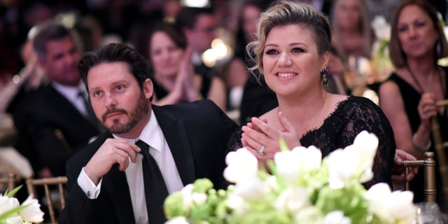 Brandon Blackstock and Kelly Clarkson attend Muhammad Ali's Celebrity Fight Night XXI in March 2015.