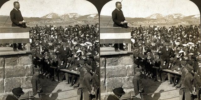 President Theodore Roosevelt's western tour included a speech at the entrance to Yellowstone National Park. Photographic print on stereo card, stereograph, 1903. (Universal History Archive/UIG via Getty images)