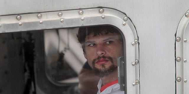 Nathan Carman arrives to the Coast Guard base in Boston on Sept. 27, 2016, after surviving the sinking of his 32-foot fishing boat near Block Canyon, off New York, in the Atlantic Ocean on Sept. 18. 