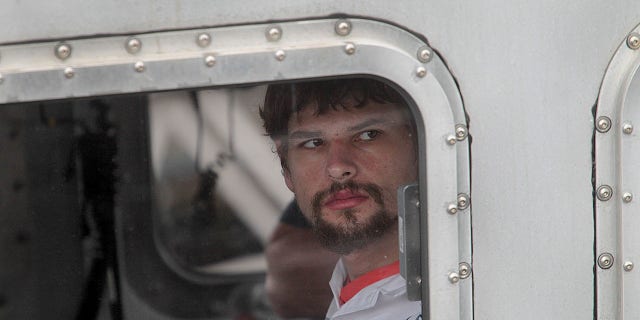 Nathan Carman arrives at the Coast Guard base in Boston on Sept. 27, 2016, after surviving the sinking of his 31-foot fishing boat near Block Canyon, off New York, in the Atlantic Ocean on Sept. 18.