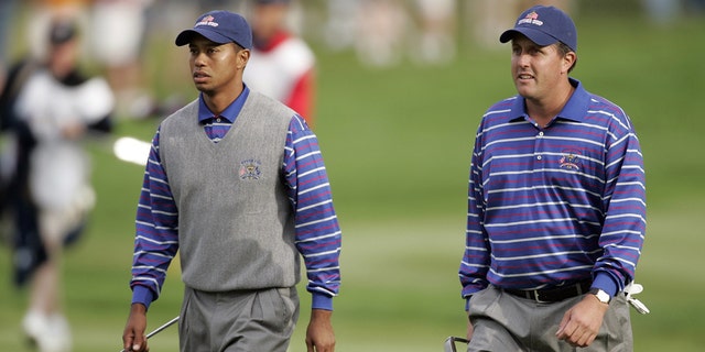 Golf: Ryder Cup, Phil Mickelson and Tiger Woods during Friday Fourball matches at Oakland Hills, Bloomfield Hills, MI on September 17, 2004. 