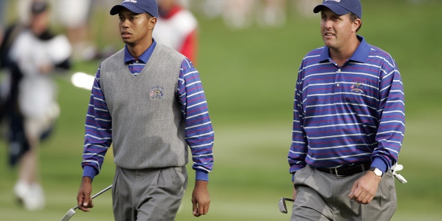 Golf: Ryder Cup, Phil Mickelson and Tiger Woods during Friday Fourball matches at Oakland Hills, Bloomfield Hills, MI on September 17, 2004.