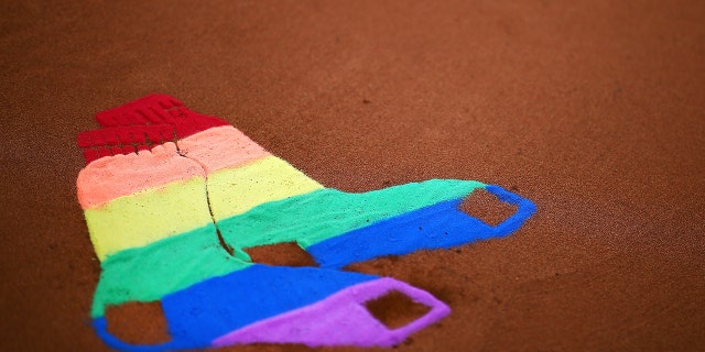 The Fenway Park mound displays the Red Sox logo as a Pride flag in honor of Pride night at Fenway Park before a game between the Detroit Tigers and the Boston Red Sox on June 07, 2018 in Boston, Massachusetts.  