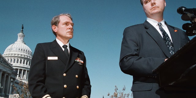 Another anthrax discovery on the Hill, this time in the Ford building. U.S. Capitol Attending Physician Dr. John Eisold, left, and Lt. Dan Nichols of the Capitol Police address reporters on the situation.