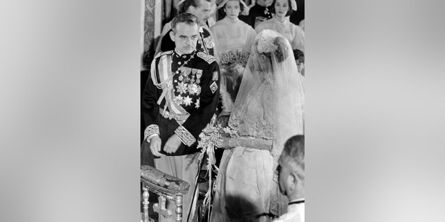 Prince Rainier III of Monaco and Grace Kelly on their wedding day, circa 1956.