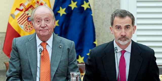 Juan Carlos with his son, King Felipe VI of Spain.