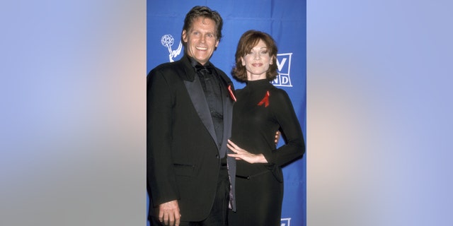 Jeff Conaway and Marilu Henner attend the Primetime Emmy Awards on Aug. 29, 1998, in Pasadena, California.