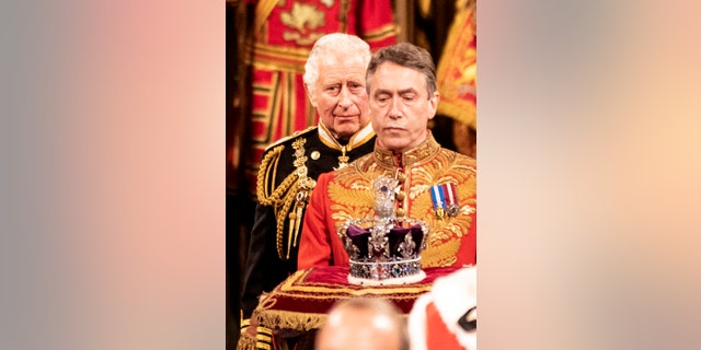 Prince Charles processes along the Royal gallery during the ceremonial state opening of Parliament at the Palace of Westminster on May 10, 2022, in London, England.