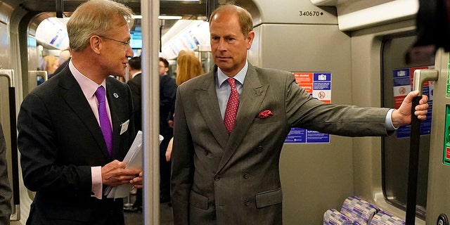 Prince Edward rides on an Elizabeth Line train to mark the completion of London's Crossrail project at Paddington Station on May 17, 2022.