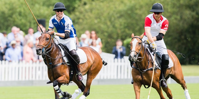 Prince William, Duke of Cambridge and Prince Harry, Duke of Sussex play during King Power Royal Charity Polo Day at Billingbear Polo Club on July 10, 2019 in Wokingham, England.  This event happened before the Duke and Duchess of Sussex announced they were stepping down as senior members of the British Royal Family.
