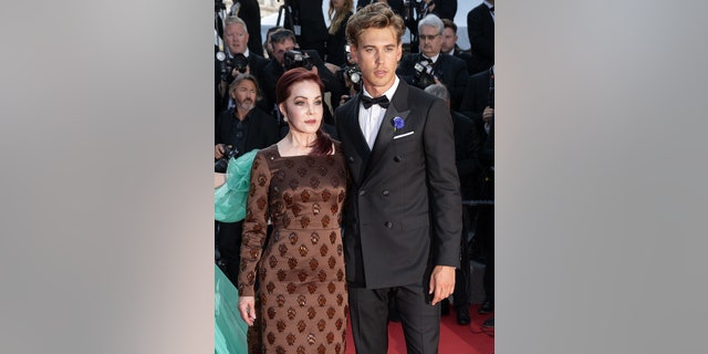 Austin Butler and Priscilla Presley attend the screening of "Elvis" during the 75th annual Cannes Film Festival on May 25, 2022 in Cannes, France.
