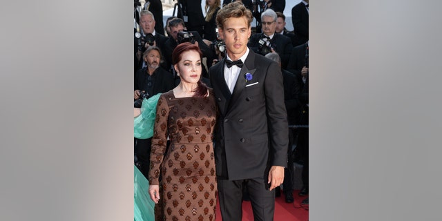 Austin Butler and Priscilla Presley attend the screening of "Elvis" during the 75th annual Cannes Film Festival.