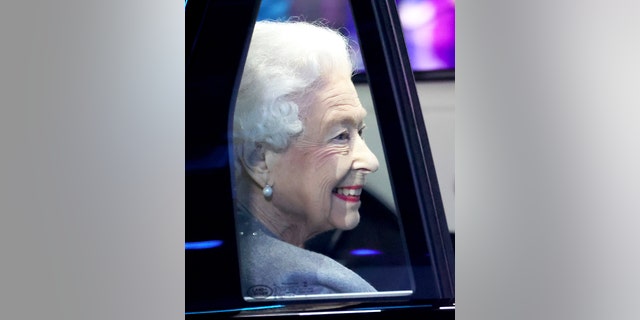 Queen Elizabeth II departs her official platinum jubilee celebration "A Gallop Through History" performance at the Royal Windsor Horse Show at Home Park on May 15, 2022, in Windsor, England.