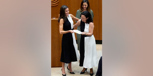 Queen Letizia of Spain, left, and Inmaculada Vivas Teson, right, attend the "Reina Letizia 202" awards at the Asamblea de Extremadura May 4, 2022, in Merida, Spain. 