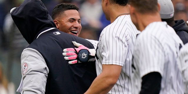 New York's Gleyber Torres celebrates after hitting a walkoff home run against the Texas Rangers at Yankee Stadium, Sunday, May 8, 2022.