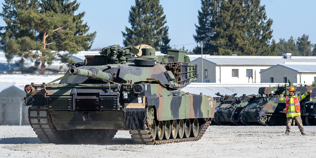 A U.S. Army tank is marshaled on the grounds of the Grafenwoehr military training area on March 11.