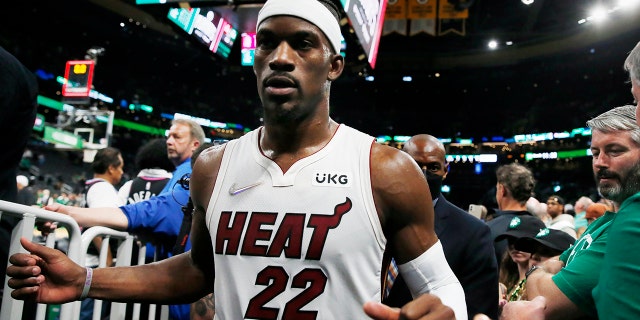 Miami Heat's Jimmy Butler leaves the court after the team's win over the Boston Celtics during Game 6 of the NBA basketball playoffs Eastern Conference finals Friday, May 27, 2022, in Boston. (AP Photo/Michael Dwyer)