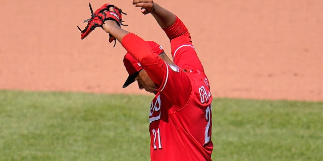 Cincinnati Reds starting pitcher Hunter Greene waits for manager David Bell to remove him during the eighth inning of a baseball game against the Pittsburgh Pirates in Pittsburgh, Sunday, May 15, 2022. The Pirates won 1-0.