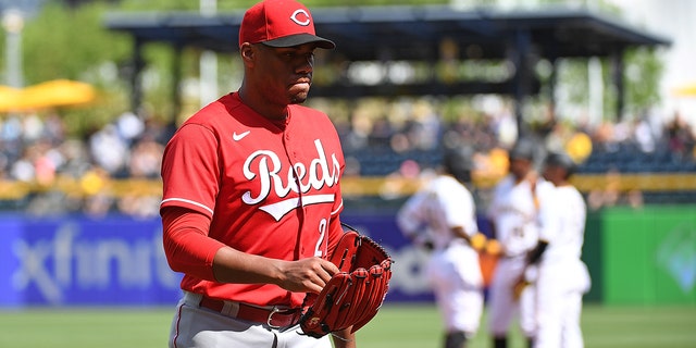 Hunter Greene #21 of the Cincinnati Reds walks to the dugout after being removed with a no-hitter still intact in the eighth inning during the game against the Pittsburgh Pirates at PNC Park on May 15, 2022 in Pittsburgh, Pennsylvania.