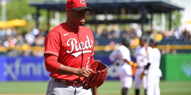 Hunter Greene #21 of the Cincinnati Reds walks to the dugout after being removed with a no-hitter still intact in the eighth inning during the game against the Pittsburgh Pirates at PNC Park on May 15, 2022 in Pittsburgh, Pennsylvania.