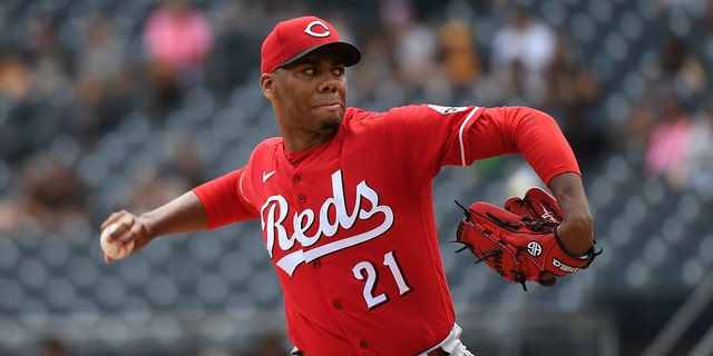 Hunter Greene #21 of the Cincinnati Reds delivers a pitch in the first inning during the game against the Pittsburgh Pirates at PNC Park on May 15, 2022 in Pittsburgh, Pennsylvania.