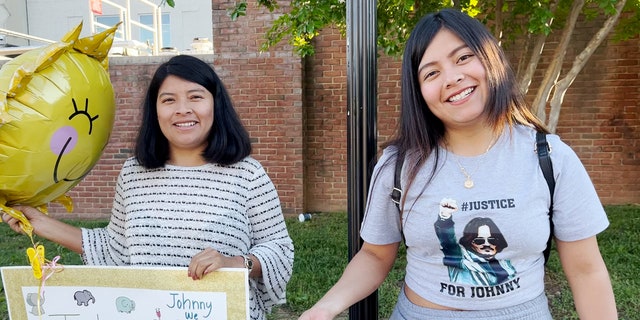 A Johnny Depp fan named Sofia wears a "#Justice for Johnny" T-shirt