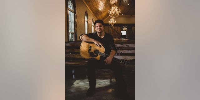 Ian Flanigan with his guitar. "You just gotta keep on chasing" whatever is most important to you, he told Fox News Digital. (nightcap entertainment)