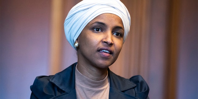 Rep. Ilhan Omar, D-Minn., is seen in the U.S. Capitols Rayburn Room during a group photo with the Congressional Black Caucus, on Wednesday, April 6, 2022. 