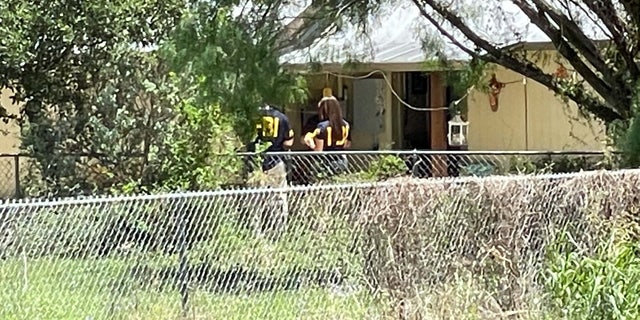 Multiple FBI agents searching Salvador Ramos' grandparents’ house, where the 18-year-old allegedly shot his grandmother before killing 21 people at an elementary school. 