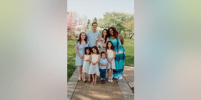 Jesse Sullivan, his wife Monique and their seven children.