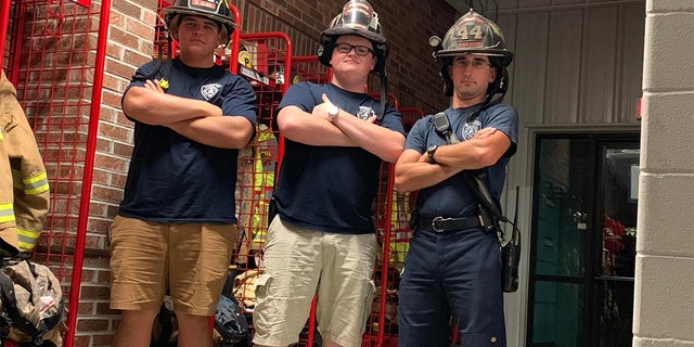 Indiana volunteer firefighter Jacob McClanahan, right, was killed Wednesday, May 18, 2022, by a stranded Kentucky motorist he stopped to help, police say.