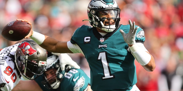 Jalen Hurts of the Philadelphia Eagles in action against the Buccaneers at Raymond James Stadium on Jan. 16, 2022, in Tampa, Florida.