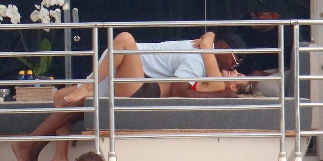 Jamie Foxx packed on the PDA with a mystery woman aboard a luxury yacht in Cannes over the weekend.