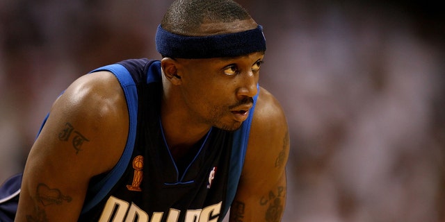 Jason Terry of the Dallas Mavericks looks on against the Heat during the 2006 NBA Finals, June 18, 2006, at American Airlines Arena in Miami, Florida.