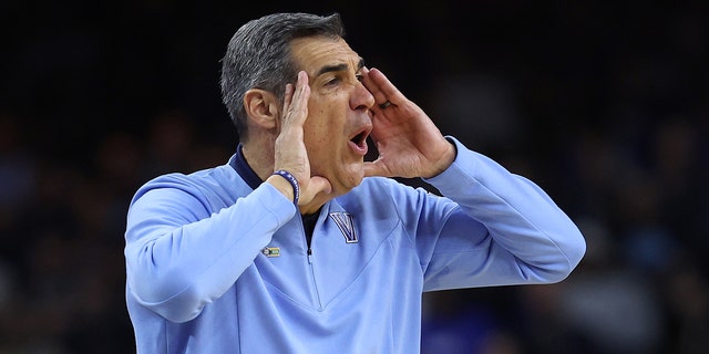 Head coach Jay Wright of the Villanova Wildcats looks on in the first half of the game against the Kansas Jayhawks during the 2022 NCAA Men's Basketball Tournament Final Four semifinal at Caesars Superdome on April 02, 2022 in New Orleans, Louisiana.