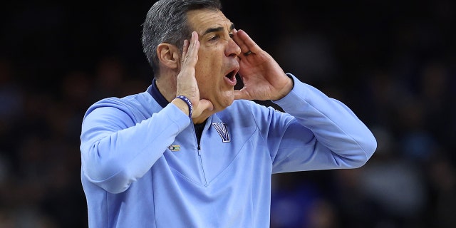 Head coach Jay Wright of the Villanova Wildcats looks on in the first half of the game against the Kansas Jayhawks during the 2022 NCAA Men's Basketball Tournament Final Four semifinal at Caesars Superdome on April 02, 2022 in New Orleans, Louisiana.