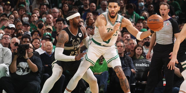 BOSTON, MA - MAY 11: Wesley Matthews #23 of the Milwaukee Bucks plays defense on Jayson Tatum #0 of the Boston Celtics during Game 5 of the 2022 NBA Playoffs Eastern Conference Semifinals on May 11, 2022 at the TD Garden in Boston, Massachusetts.