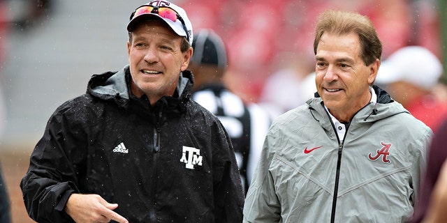 Head coach Jimbo Fisher of the Texas A&versterker;M Aggies talks at midfield with head coach Nick Saban of the Alabama Crimson Tide at Bryant-Denny Stadium Sept. 22, 2018, in Tuscaloosa, Ala.  