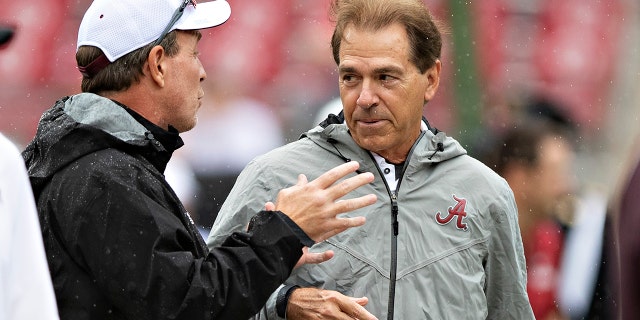 Aggies' coach Jimbo Fisher talks at with Alabama's coach Nick Saban at Bryant-Denny Stadium on Sept. 22, 2018, in Tuscaloosa, Alabama. The Crimson Tide won, 45-23.