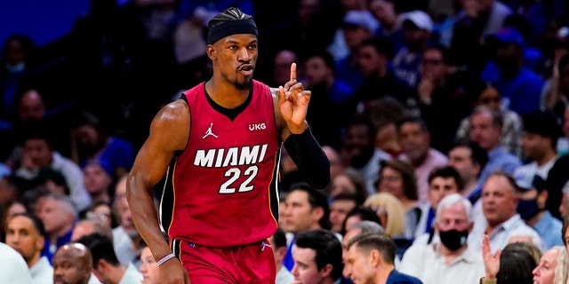 Miami Heat's Jimmy Butler gestures as he runs down the court during the second half of Game 6 of an NBA basketball second-round playoff series against the Philadelphia 76ers, Thursday, May 12, 2022, in Philadelphia. 