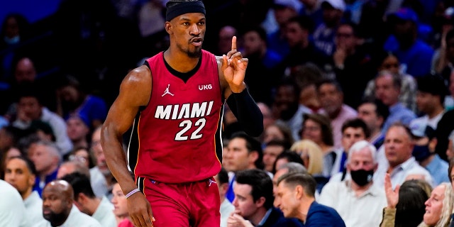 Miami Heat's Jimmy Butler gestures as he runs down the court during the second half of Game 6 of an NBA basketball second-round playoff series against the Philadelphia 76ers, Thursday, May 12, 2022, in Philadelphia.