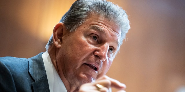 Sen. Joe Manchin questions Health and Human Services Secretary Xavier Becerra during a Senate hearing on Wednesday, May 4, 2022.