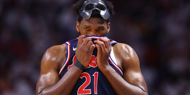 Joel Embiid of the Philadelphia 76ers reacts against the Heat during the semifinals at FTX Arena on May 10, 2022, in Miami, Florida.