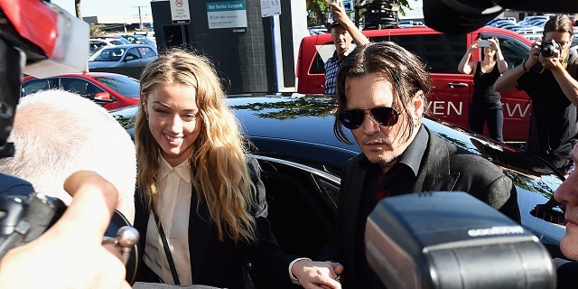 Johnny Depp Amber Heard arrive at Southport Magistrates Court in April 2016