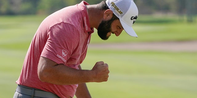 Jon Rahm, of Spain, celebrates after winning the Mexico Open at Vidanta, in Puerto Vallarta, Mexico, Sunday, May 1, 2022.