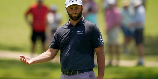 Jon Rahm of Spain stands on the 13th green during a practice round for the PGA Championship May 18, 2022, in Tulsa, Okla.