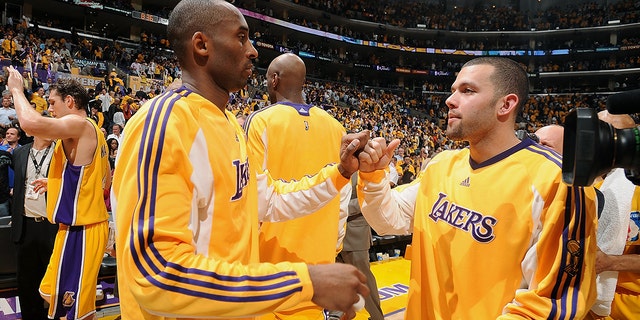 Kobe Bryant of the Lakers celebrates with Jordan Farmar during the 2009 NBA Finals against the Orlando Magic at Staples Center on June 4, 2009, in Los Angeles.